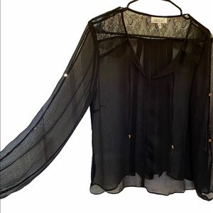 Jennifer Lopez black sheer top with lace